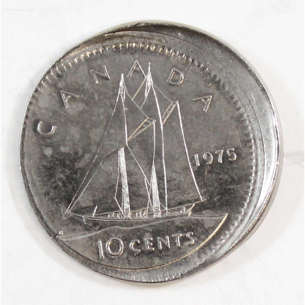 1975 Off Center Strike Canada 10 cent Brilliant Uncirculated (MS-63) $