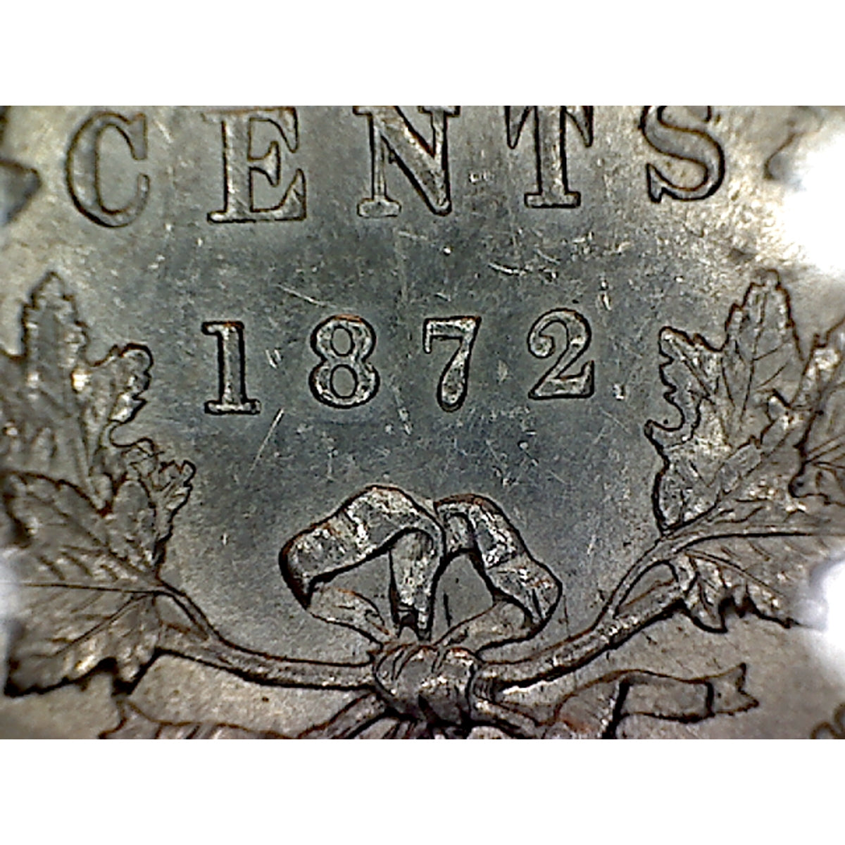 1872H 7 Over 7 Canada 25-cents Almost Uncirculated (AU50) $