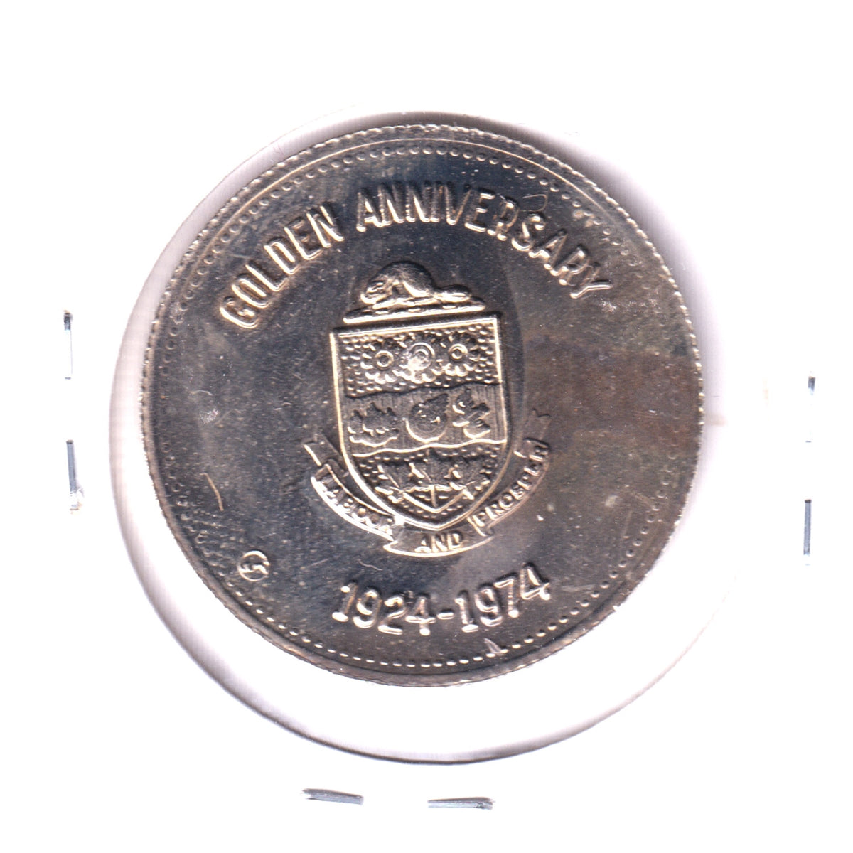 1974 Oshawa Golden Anniversary Trade Dollar: The City that Moto-vates (May have spot)