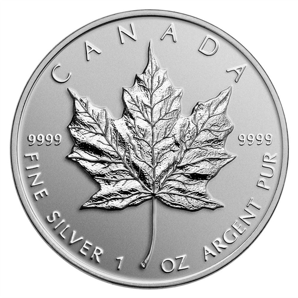 Random Date $5 1oz Silver Maple Leaf .9999 (No Tax) May have light toning.