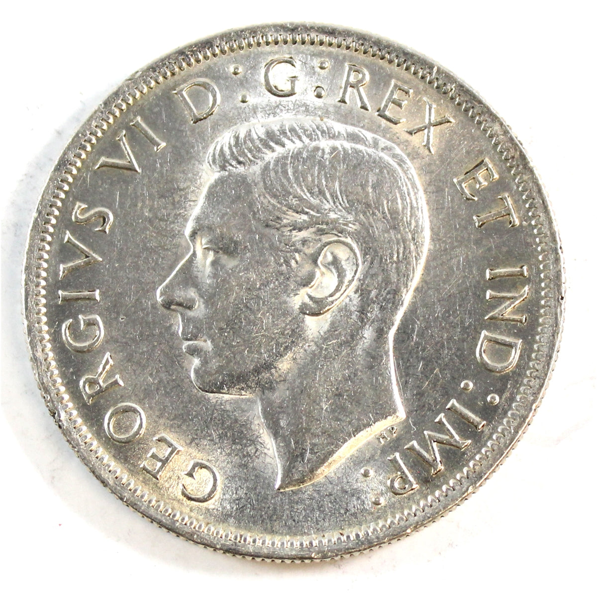 1938 Canada Dollar Almost Uncirculated (AU50)