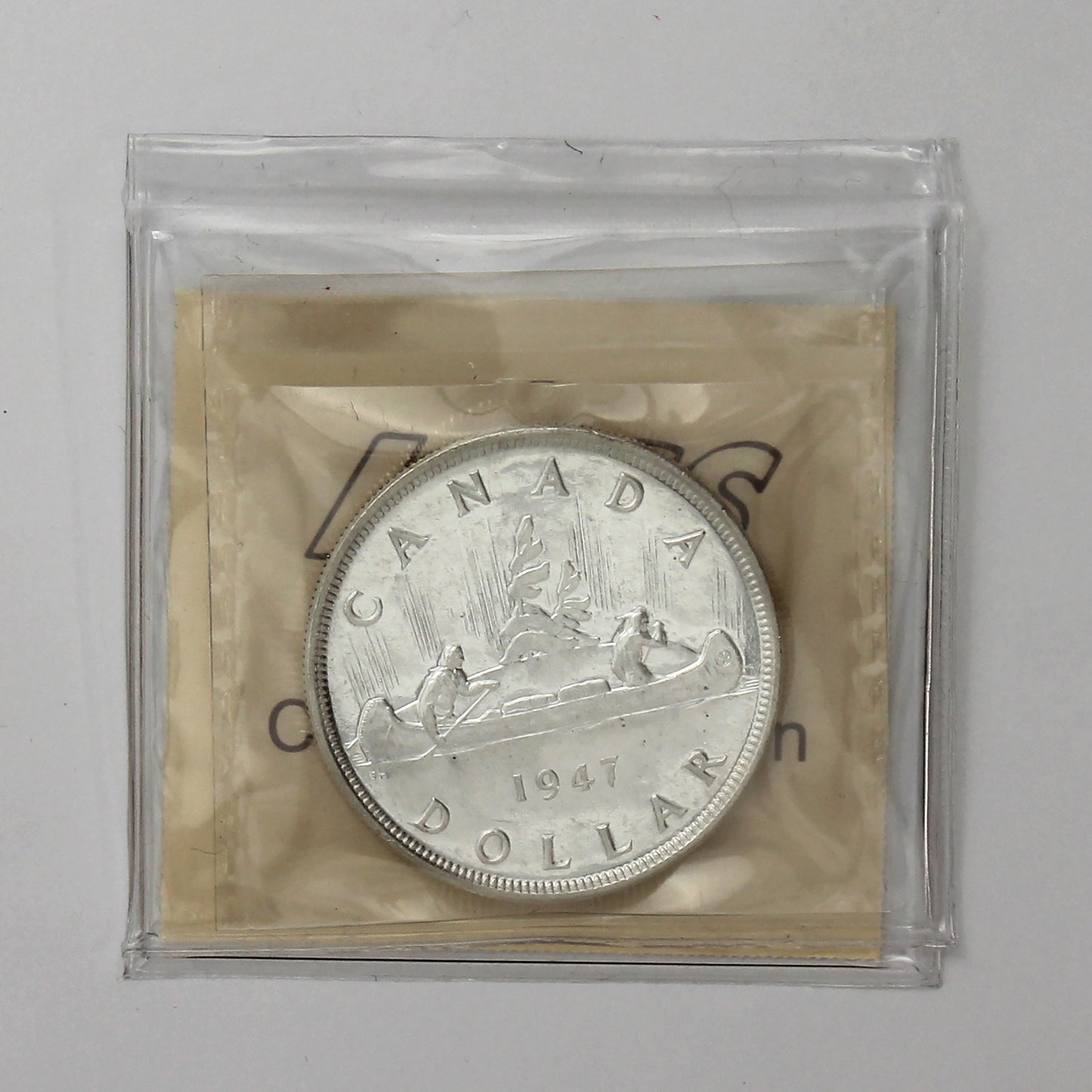 1947 Pointed 7, Dbl HP Canada Dollar ICCS Certified MS60 (XHI 064)