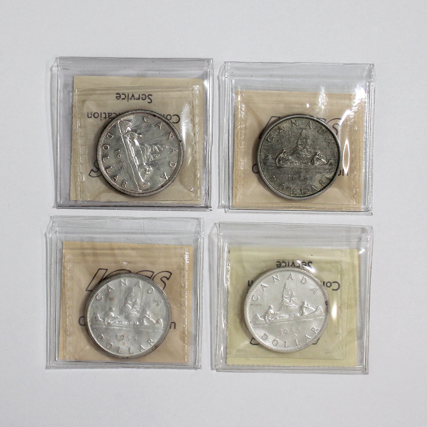 Lot of 4x 1955 Canada Dollars ICCS Certified AU50 to AU55, 4pcs (Toned)