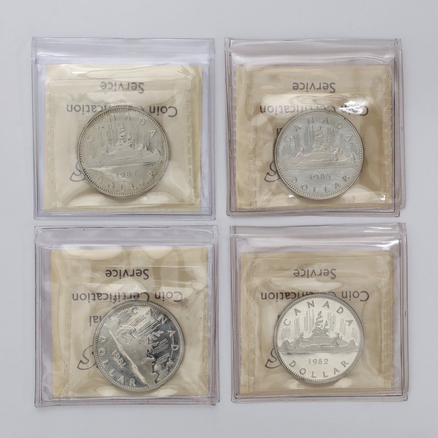 Lot of 4x 1981-1987 Canada Nickel Dollars ICCS Certified PF67 & PF68 UHC, 4pcs