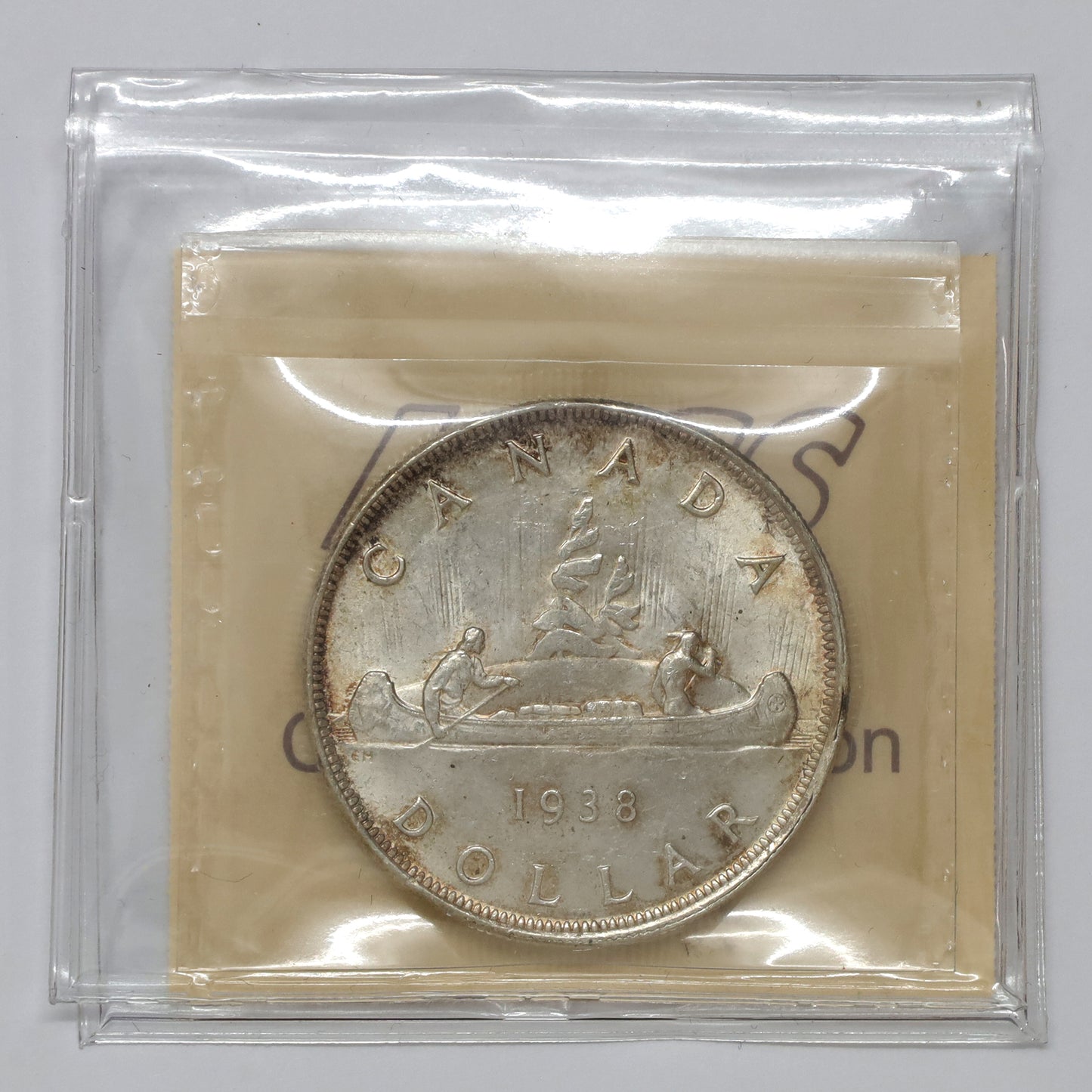 1938 Canada Dollar ICCS Certified MS64 (Lightly Toned)
