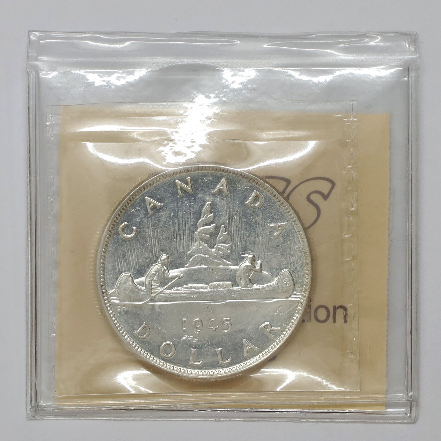 1945 5 Over 5 Canada Dollar ICCS Certified AU55 (Scratches)