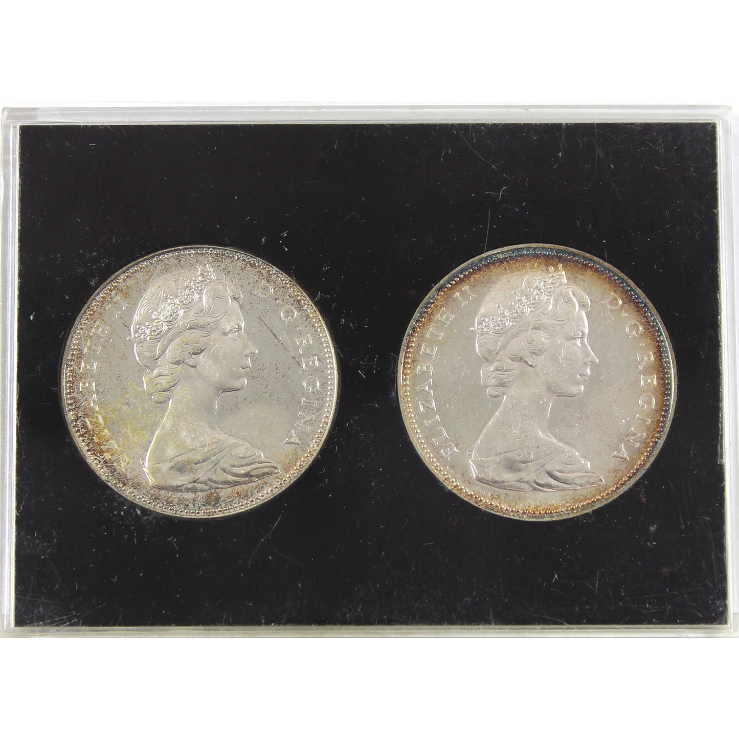 Pair of 1966 and 1967 Silver Canada Dollars in Black Holder (Impaired)