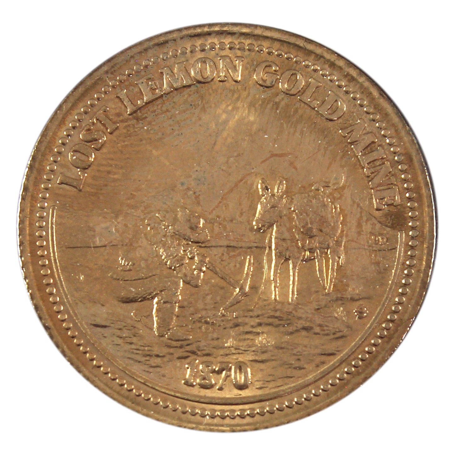 1989 Crowsnest Pass, AB Lost Lemon Gold Mine Trade Dollar Token (toned)