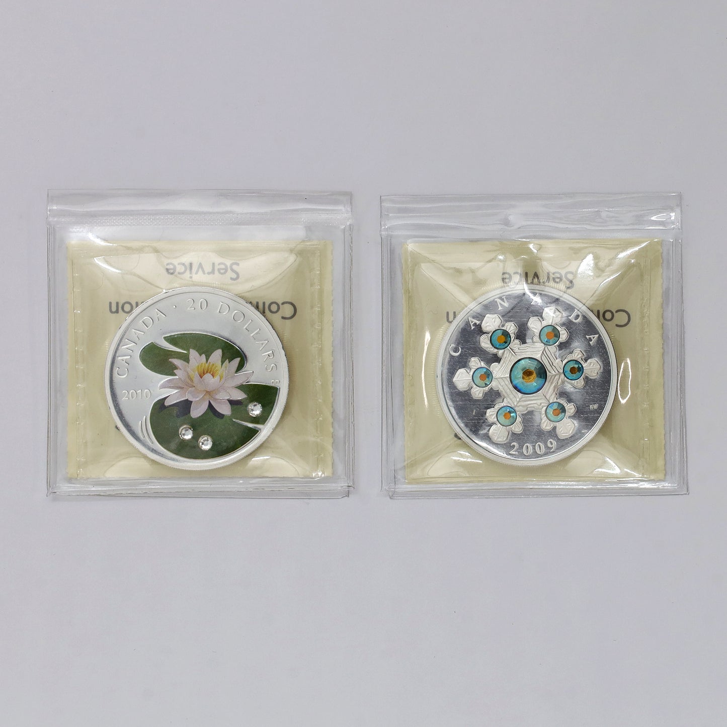 Pair of 2009 & 2010 Canada $20 Swarovski Fine Silver ICCS Cert. PF67 UHC, 2pcs (No Tax)