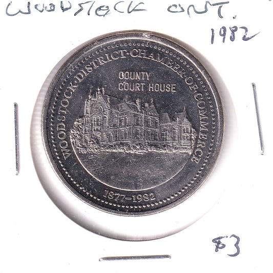 1982 Woodstock, ON,  Dairy County Dollar Trade Token: Courthouse & Snow Countess Cow