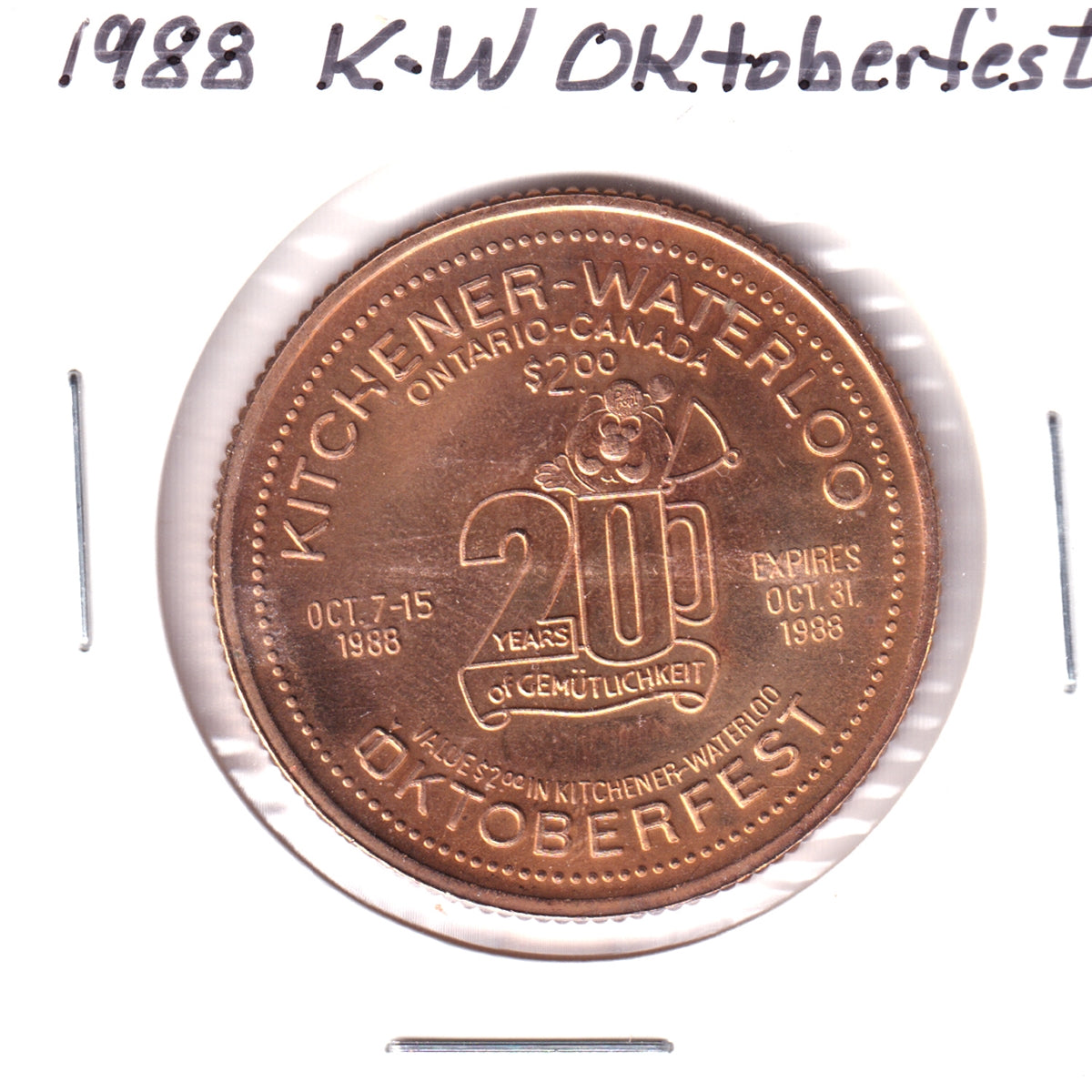 1988 K-W Oktoberfest 20th Ann. $2 Trade Token: Doon Heritage Crossroads (May be toned)
