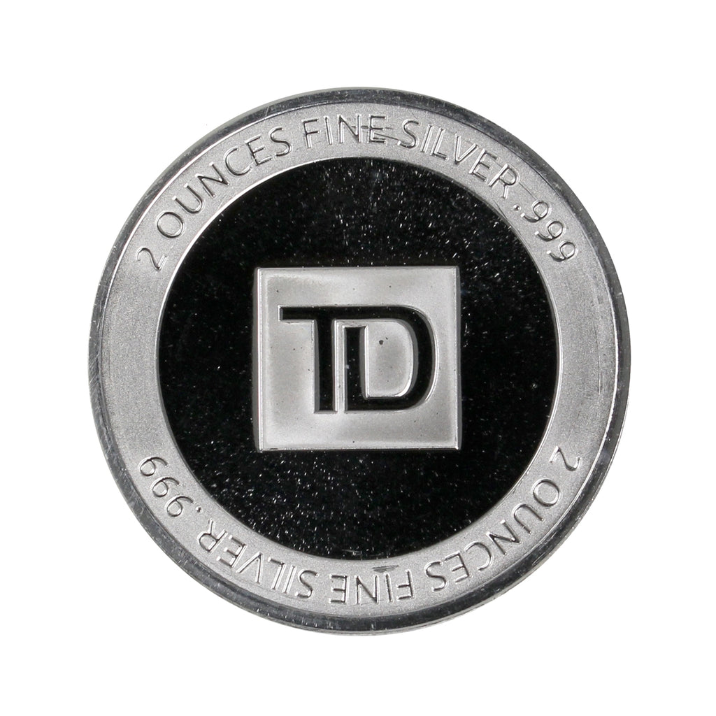 TD Bank 2oz .999 Silver Round with Capsule (No Tax) May have light toning