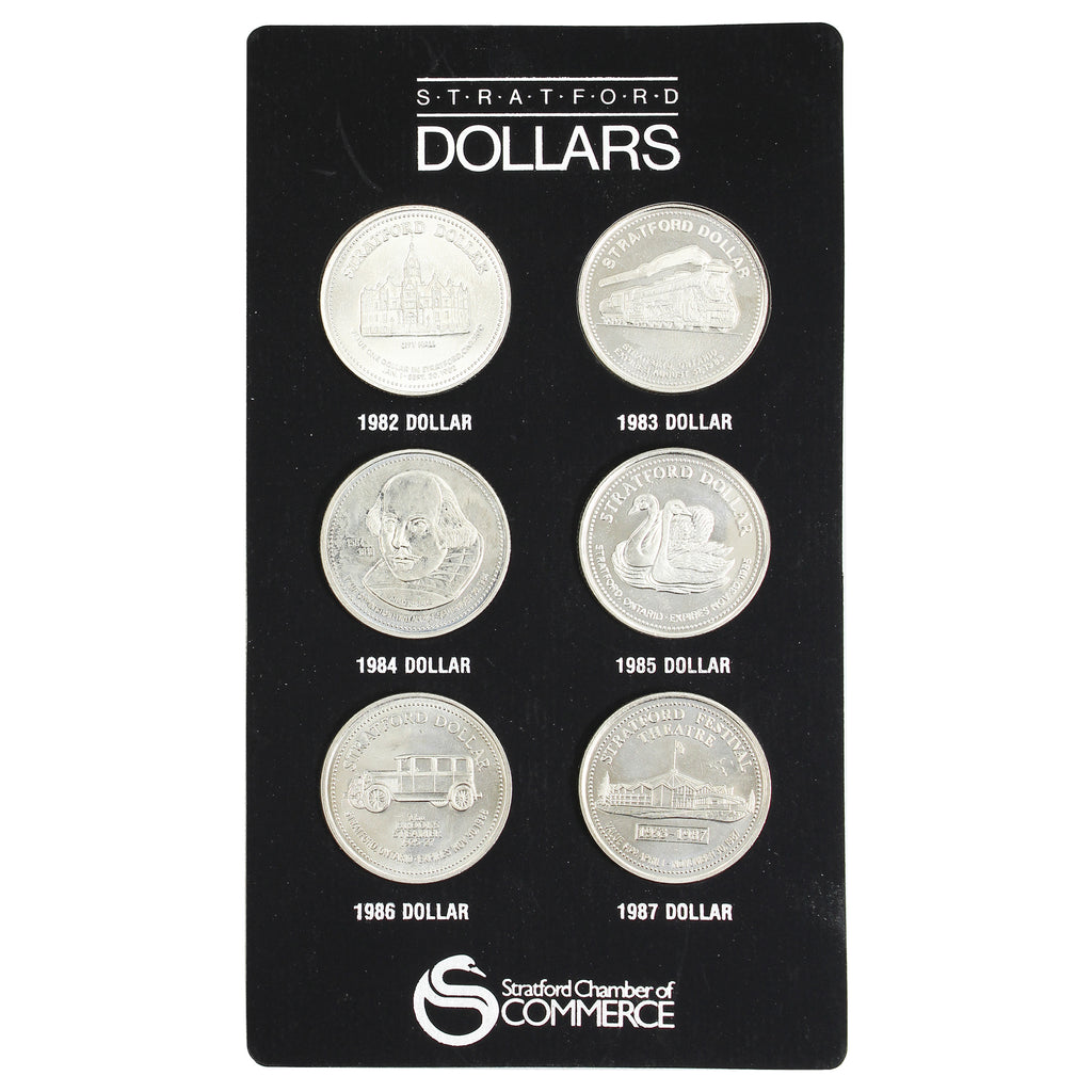 1982-1987 Stratford, Ont. 6-Trade Dollar Token Set in Card (Scratched)