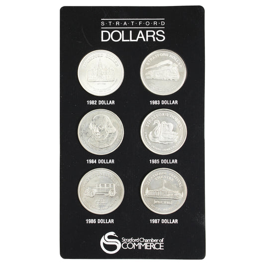 1982-1987 Stratford, Ont. 6-Trade Dollar Token Set in Card (Scratched)