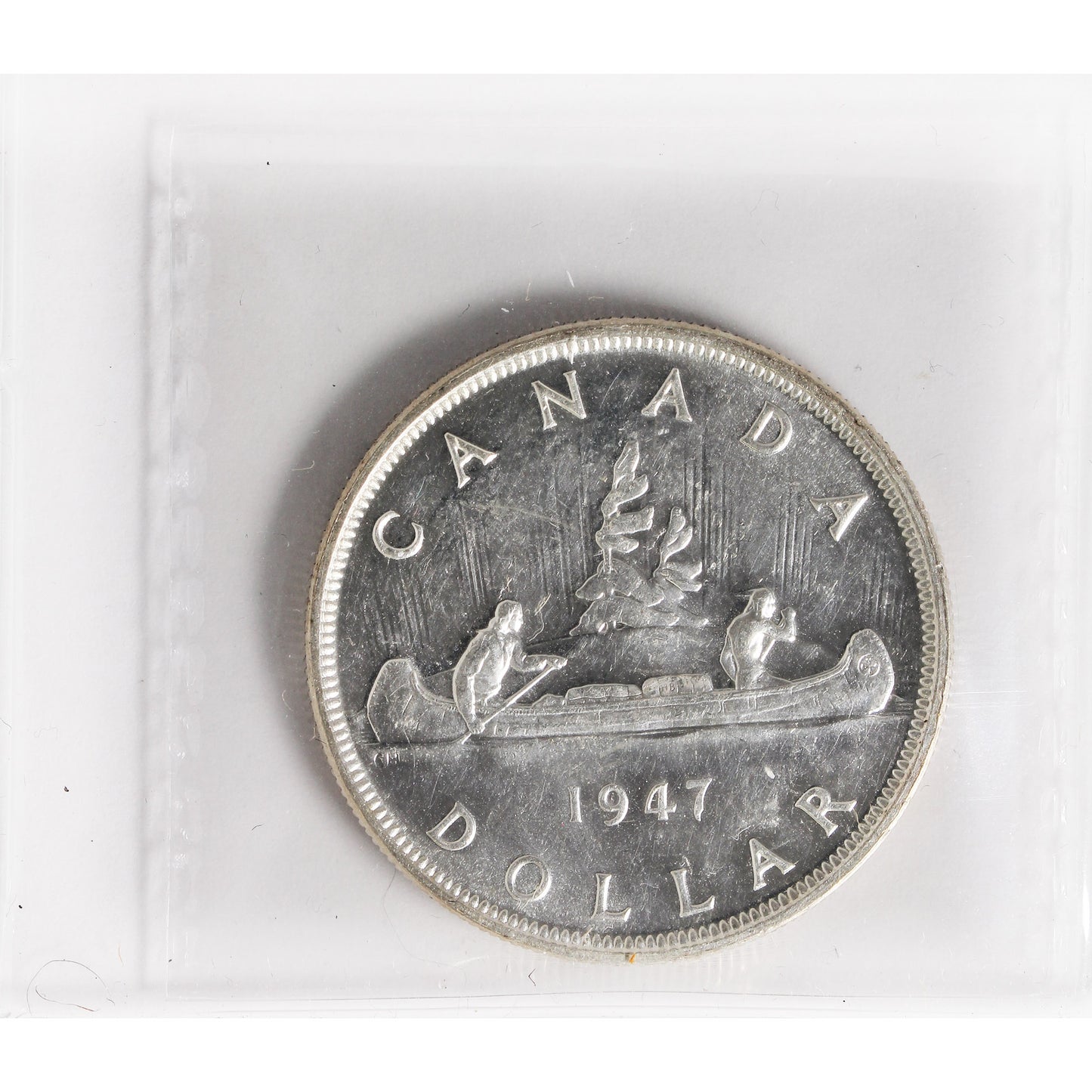 1947 Pointed 7, Quadruple HP Canada Dollar ICCS Certified MS63 (XXR 494)