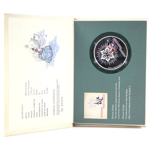 Niue 2016 $2 Disney Season's Greetings 1oz. .999 Silver in Case (No Tax) Lightly Toned.