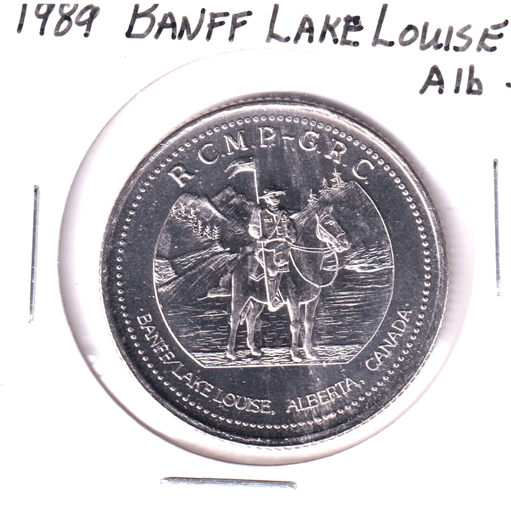 1989 Banff/Lake Louise, AB, Trade Dollar Token: RCMP / Bighorn Sheep