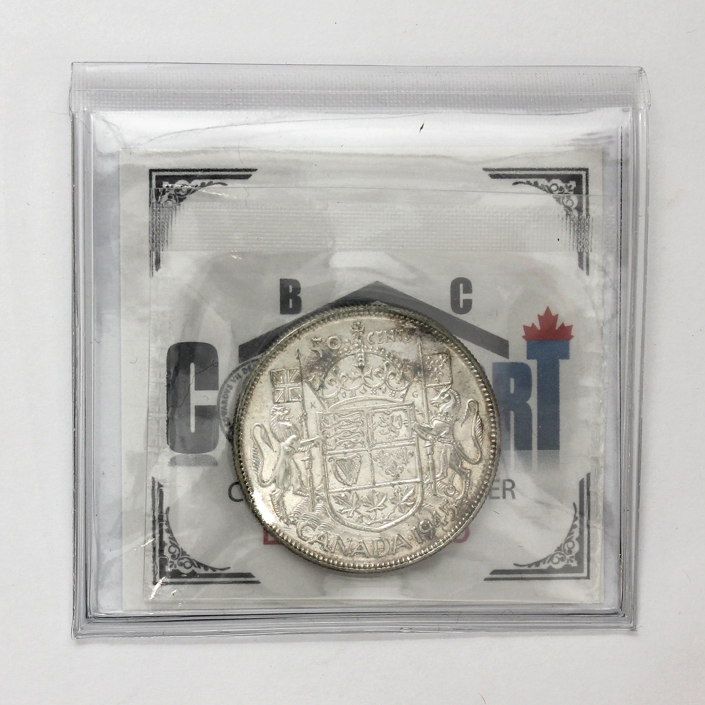 1945 5 Over 5 Canada 50-cents CMG Certified AU50 (Scratches)