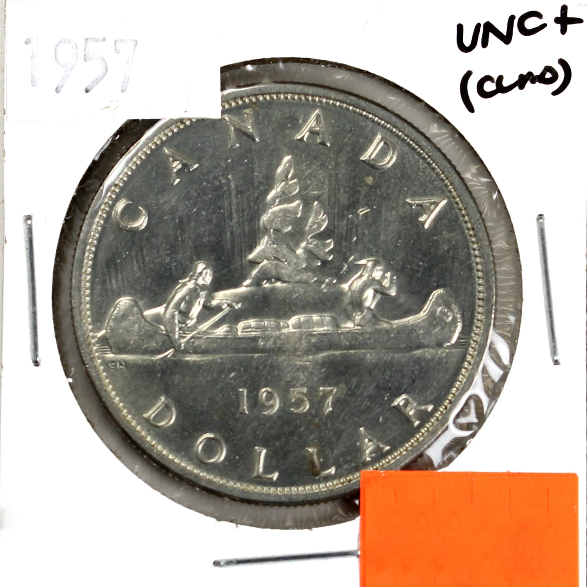 1957 Canada Dollar UNC+ (MS62) Scratched, Cleaned or Impaired