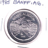 1985 Banff, AB, Trade Dollar Token: National Parks Centennial, Cave & Basin NHS
