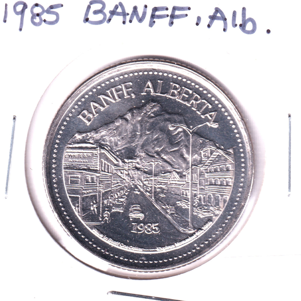 1985 Banff, AB, Trade Dollar Token: National Parks Centennial, Cave & Basin NHS