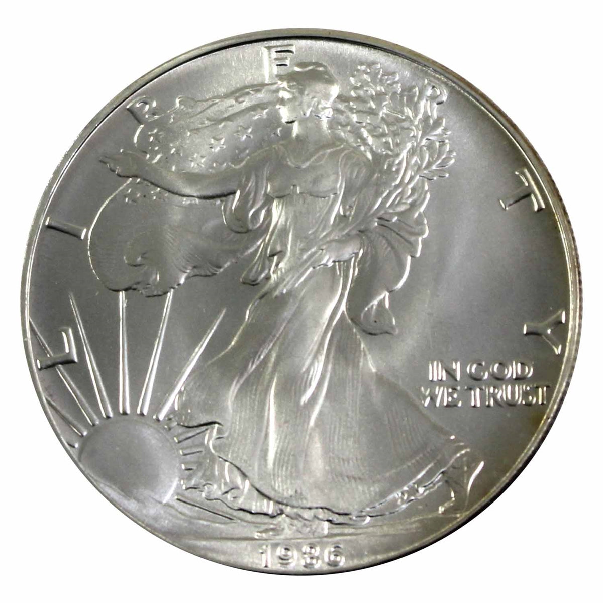 1986 US $1 American Eagle 1oz Silver (No Tax) Lightly Toned - First Year of Release!