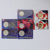 Lot of 7x Royal Canadian Mint Coins in Cards (may have scuffs, toning, or light issues)