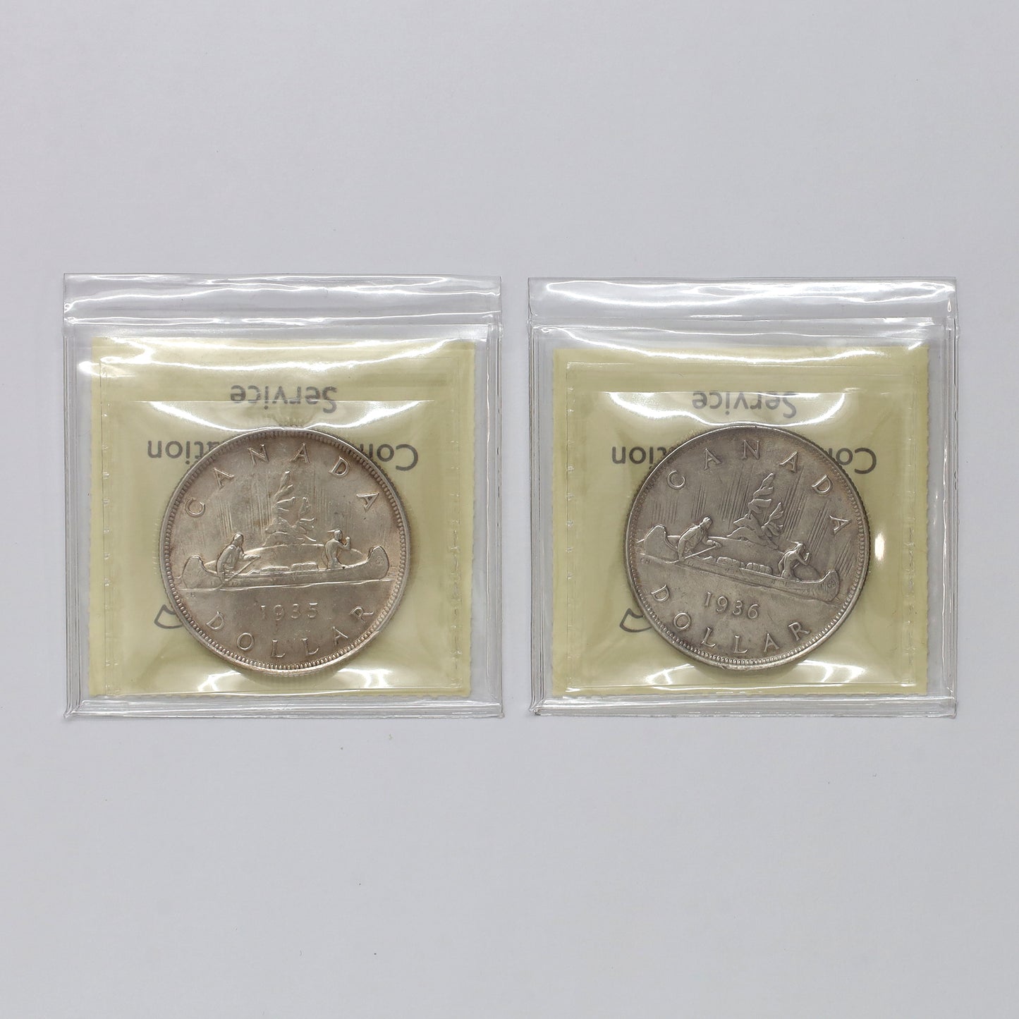 Pair of 1935 & 1936 Canada Dollars ICCS Certified EF40 & AU50, 2pcs (toning)