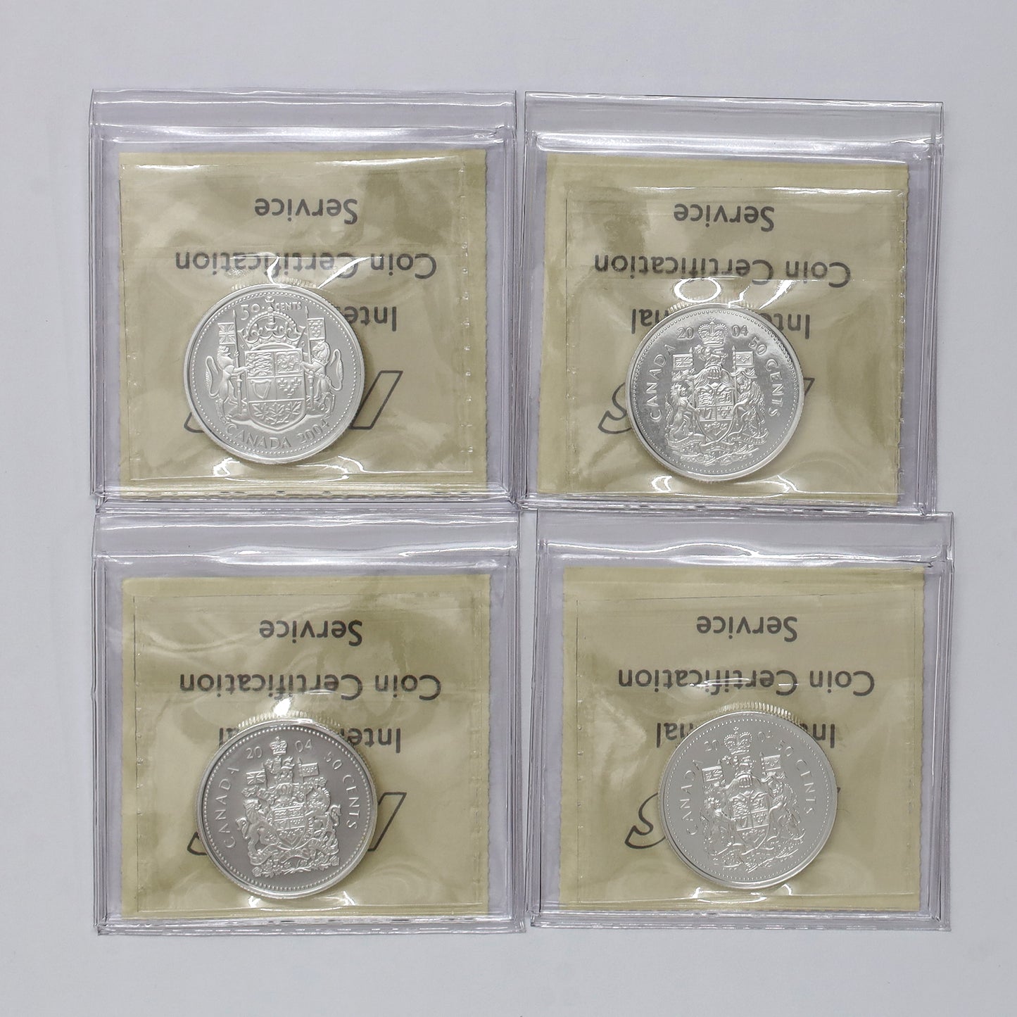 Lot of 4x 2004 50-cent Queen Elizabeth II 4-Coin Effigy Set ICCS Certified PF67 UHC