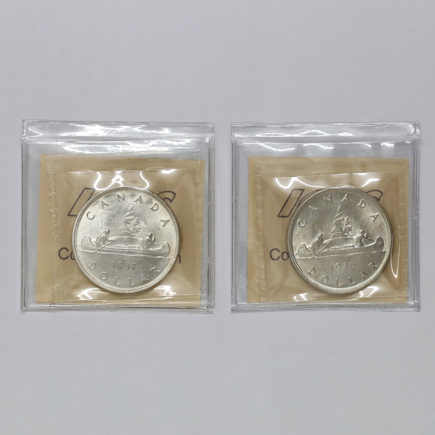 Pair of 1936 & 1937 Canada Silver Dollars ICCS Certified MS63, 2pcs