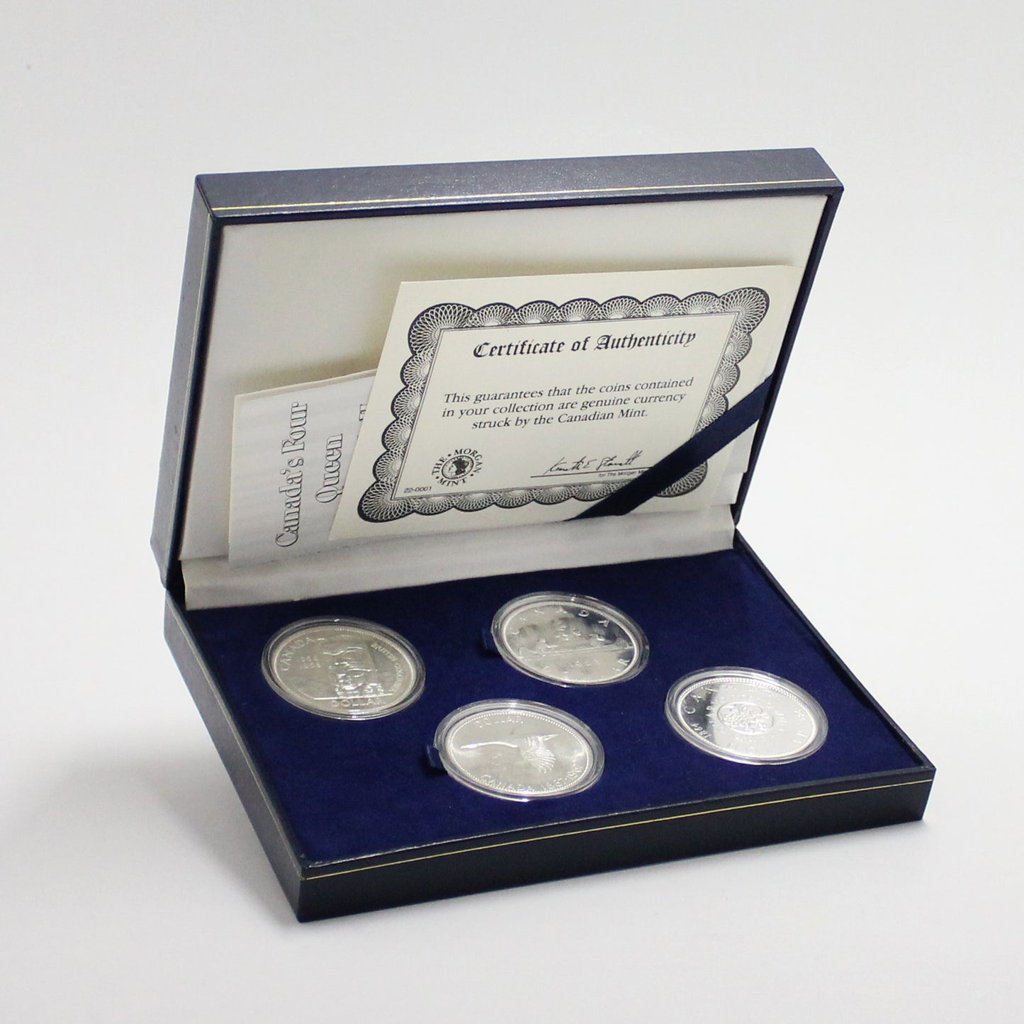 Canada's Four Queen Elizabeth II Silver Dollars 4-Coin Set in Case (light wear)
