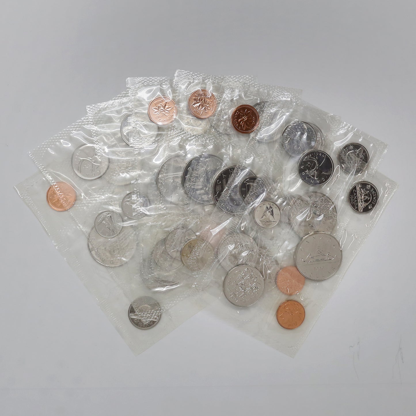 Lot of 8x 1980-1987 Canada Proof Like Sets, 8pcs (pliofilm only)