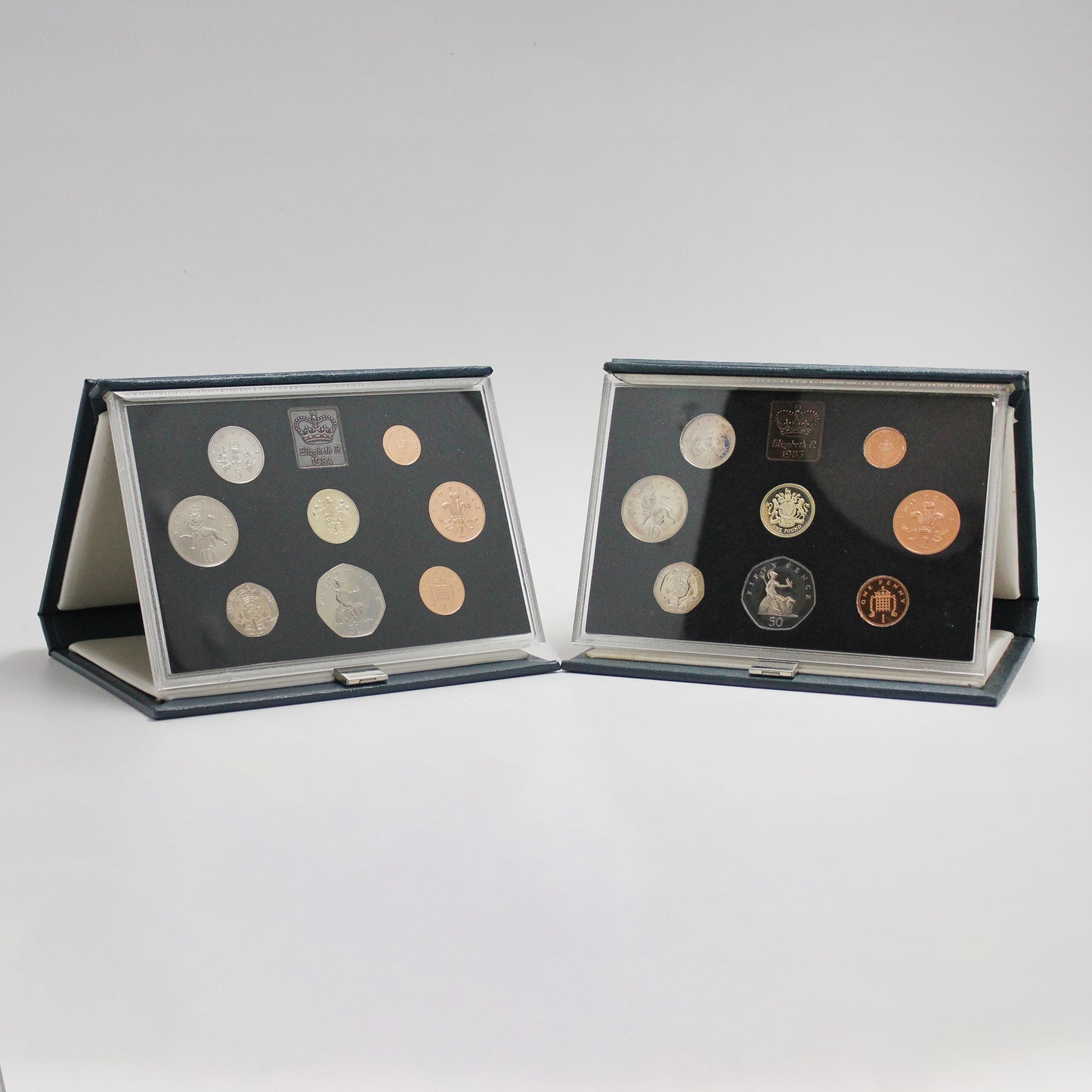 Pair of United Kingdom 1983 & 1984 8-Coin Proof Sets, 2pcs (minor wear)