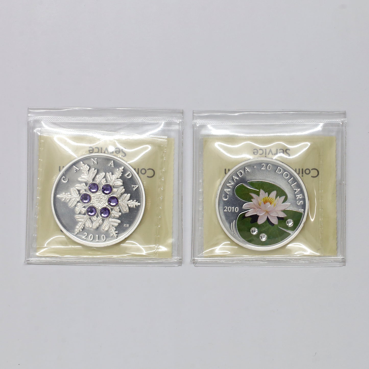 Pair of 2010 Canada $20 Crystal Fine Silver Coins ICCS Certified PF67 UHC, 2pcs (No Tax)
