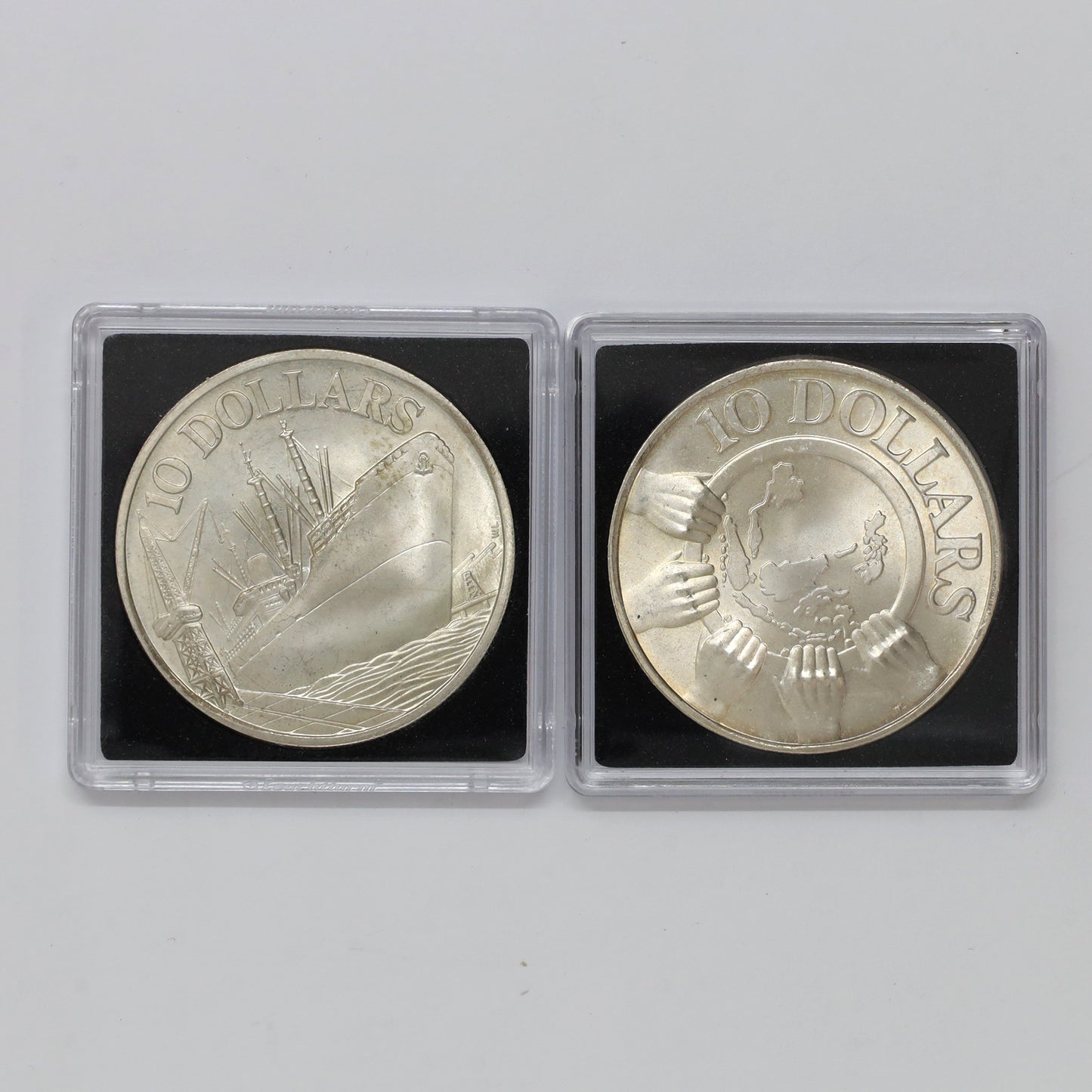 Pair of Singapore 1975 & 1977 $10 .500 Silver Coins, 2pcs