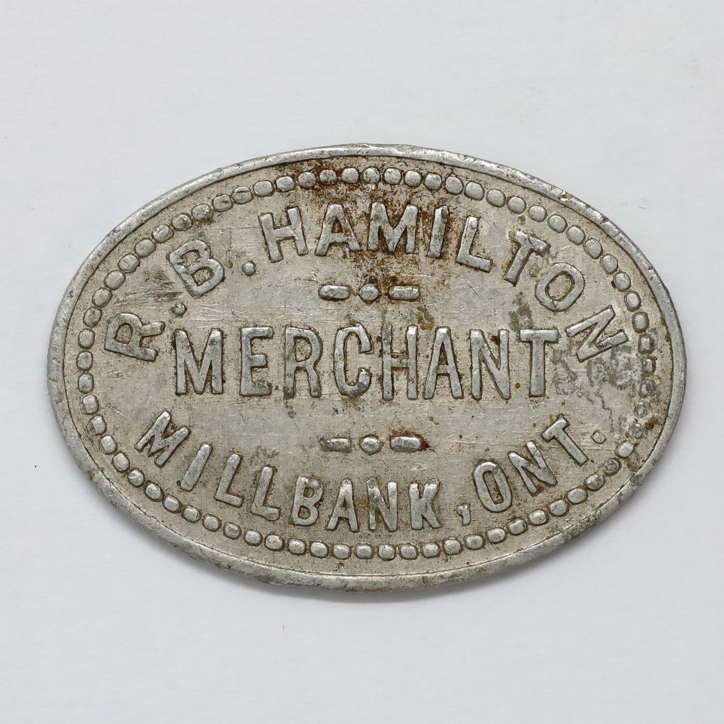 Millbank, ON, R.B. Hamilton 10-cent Oblong Merchant Token