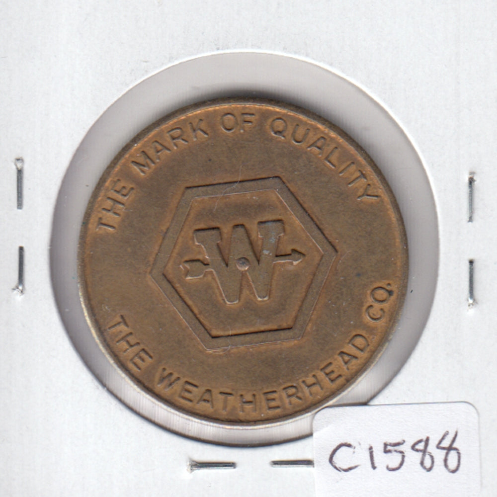 The Weatherhead Co. Spinner Token