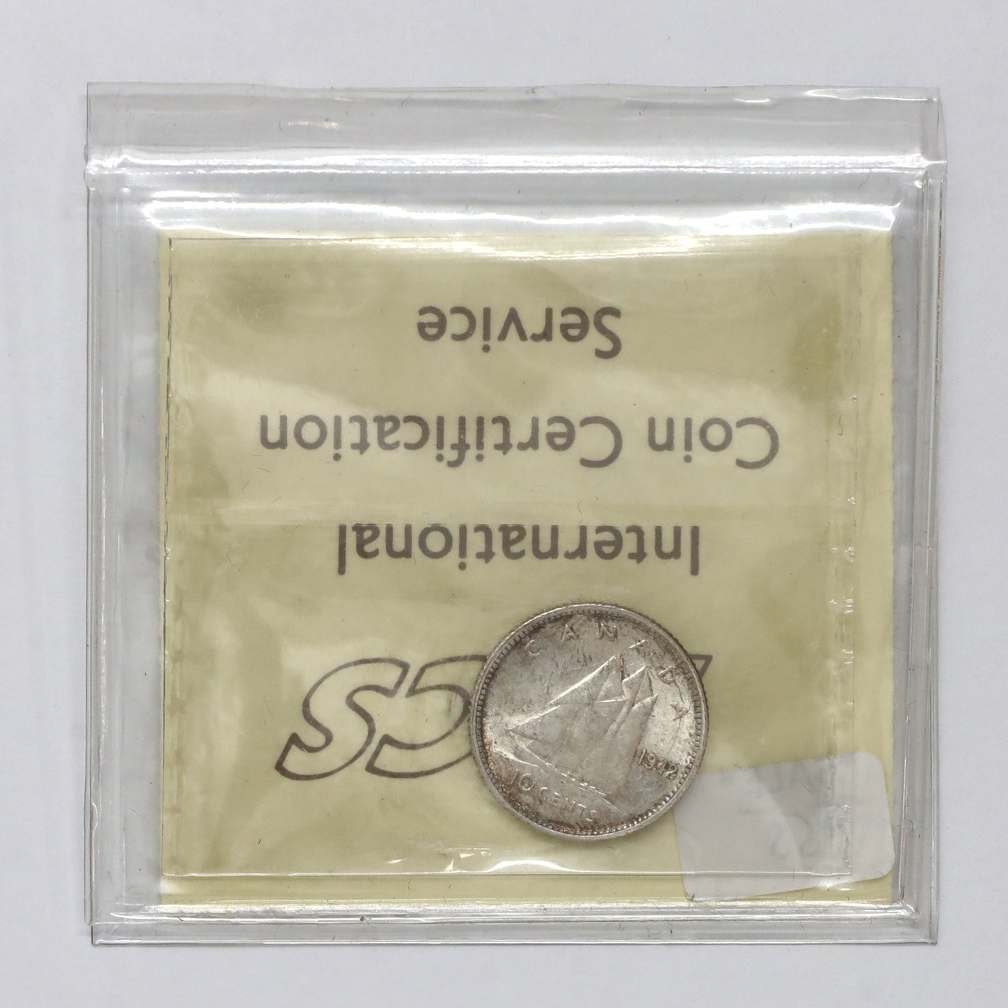 1942 Canada 10-cents ICCS Certified MS63 (Lightly Toned)