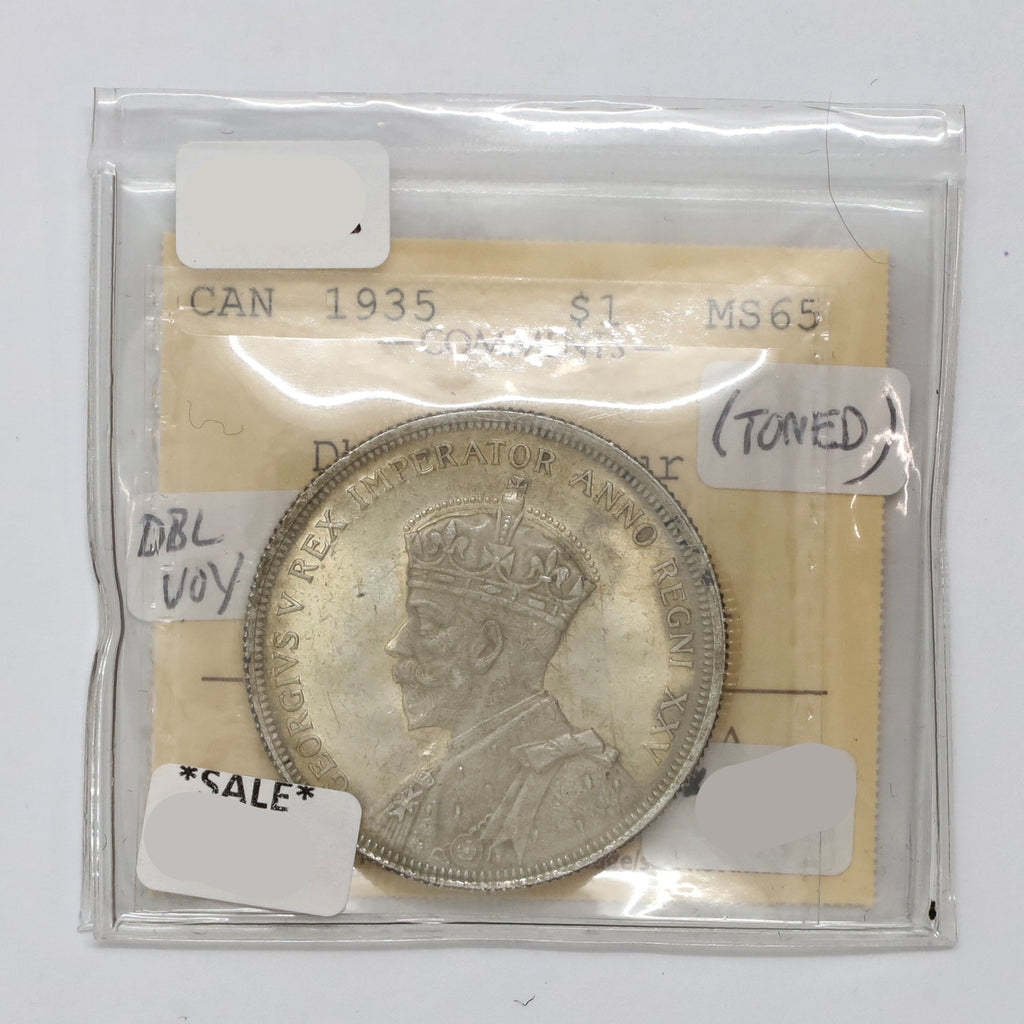 1935 Double Voyageur Canada Dollar ICCS Certified MS65 (Lightly Toned)