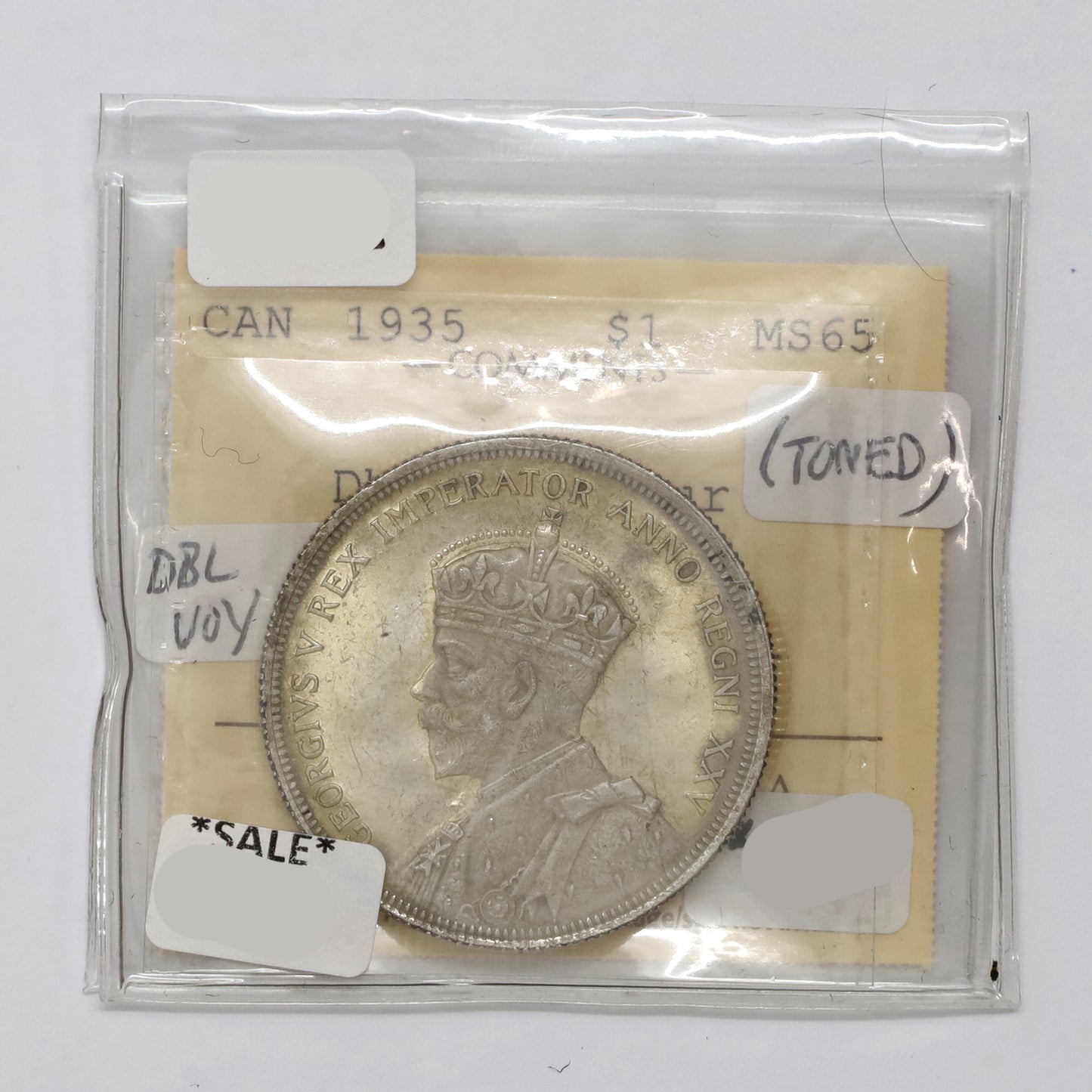 1935 Double Voyageur Canada Dollar ICCS Certified MS65 (Lightly Toned)