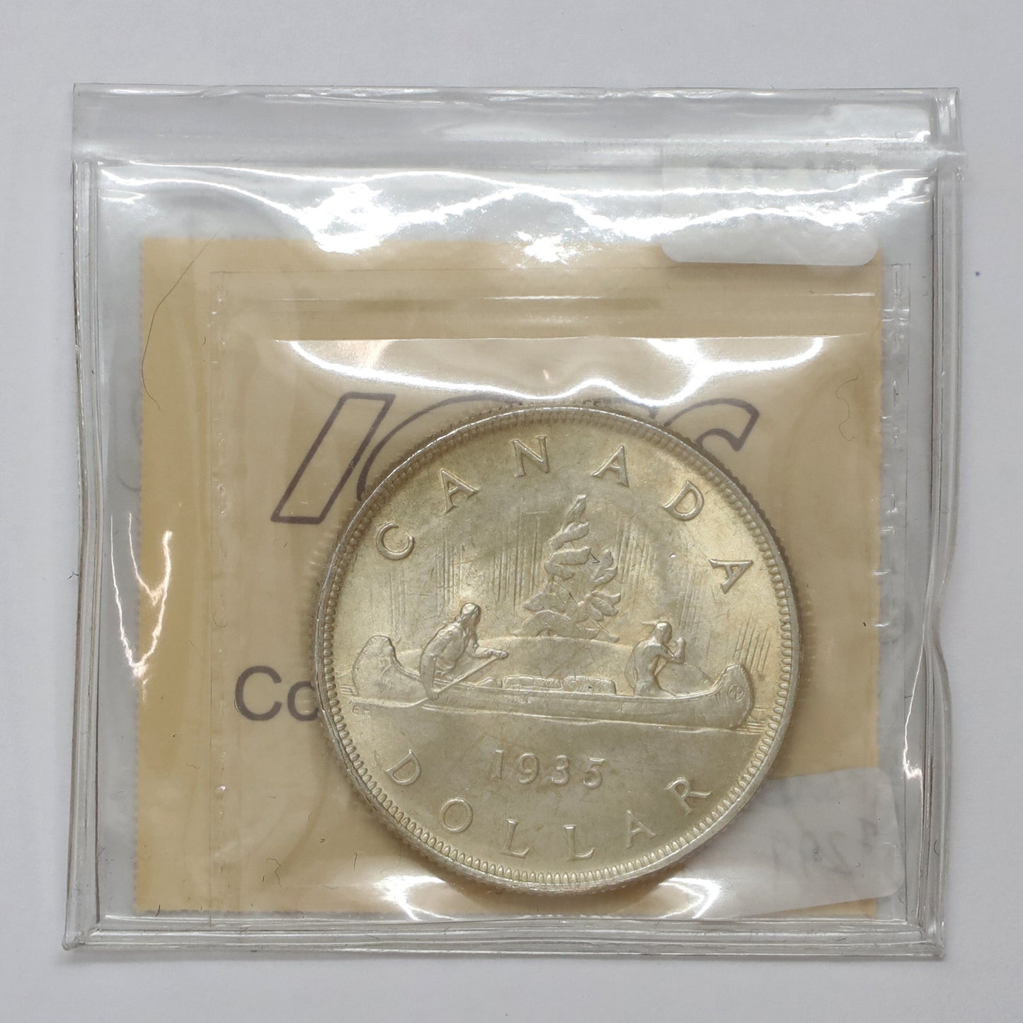 1935 Double Voyageur Canada Dollar ICCS Certified MS65 (Lightly Toned)