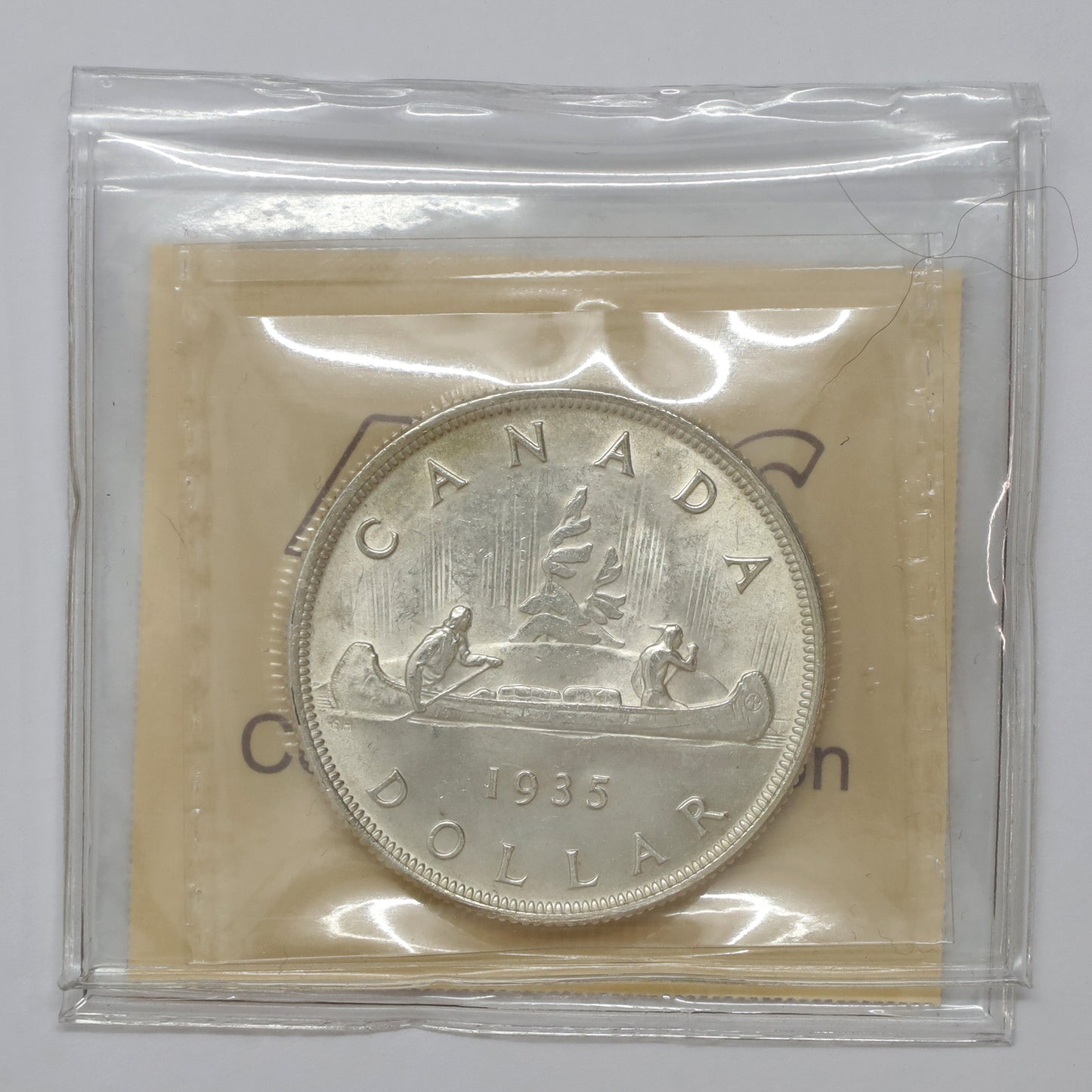 1935 Canada Dollar ICCS Certified MS65 (Lightly Toned)