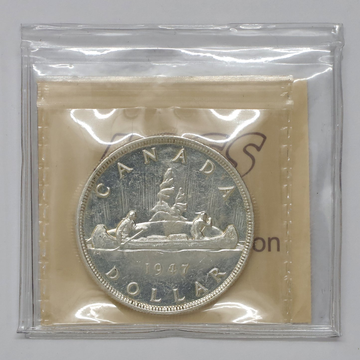 1947 Blunt 7 Canada Dollar ICCS Certified MS63 (Lightly Toned)