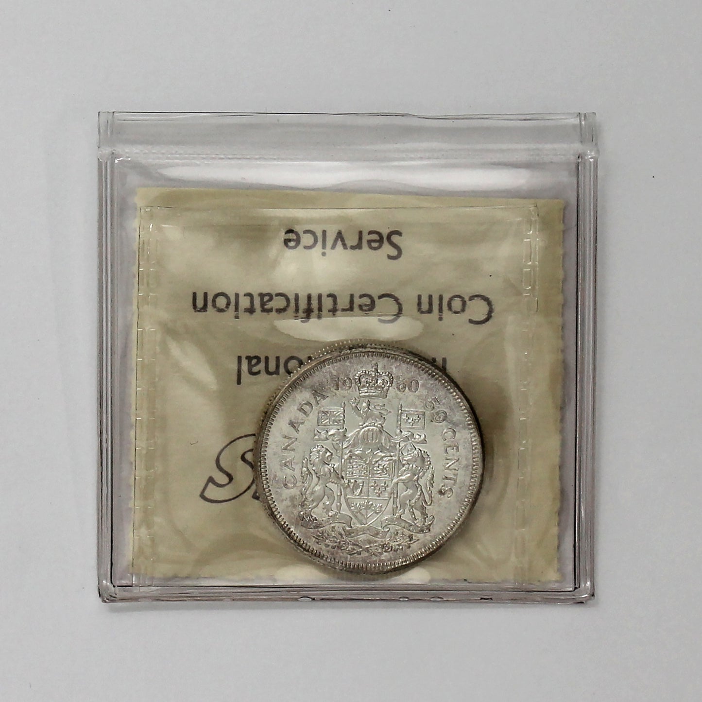 1960 Canada 50-cent ICCS Certified PL66 Heavy Cameo (Lightly Toned)