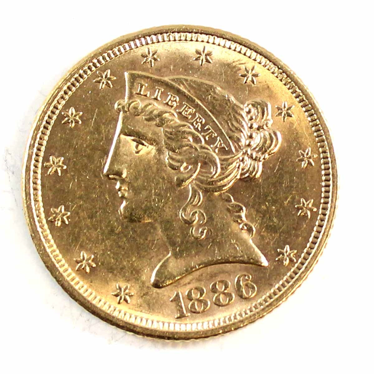 1886 USA $5.00 Gold Almost Uncirculated (AU50) $