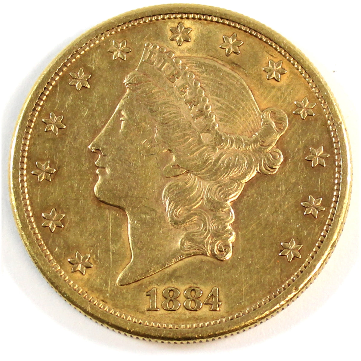 1884 S USA $20.00 Gold EF-AU (EF45) (Scratched) $