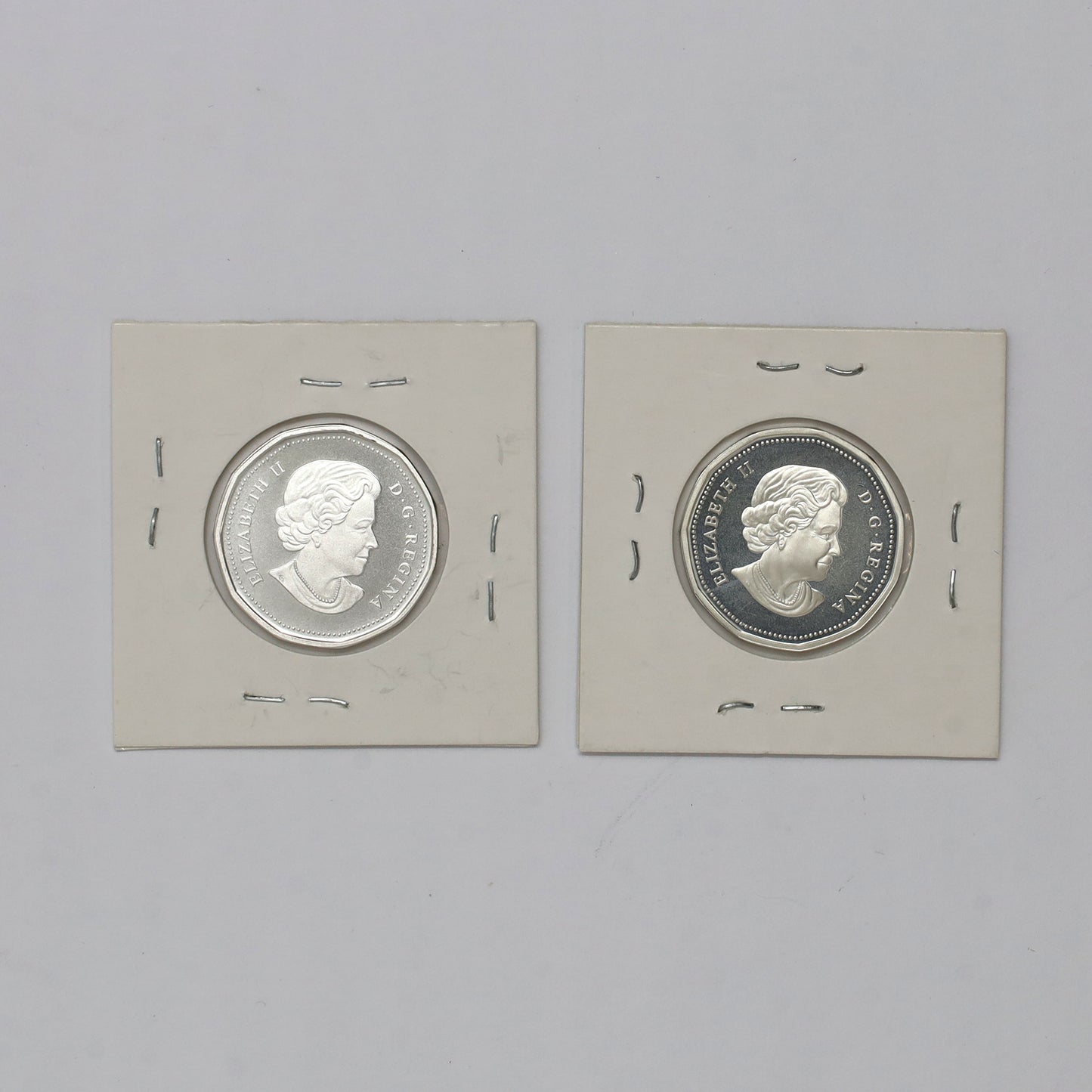 Pair of 2004 & 2012 Canada Proof Silver Loonies, 2pcs