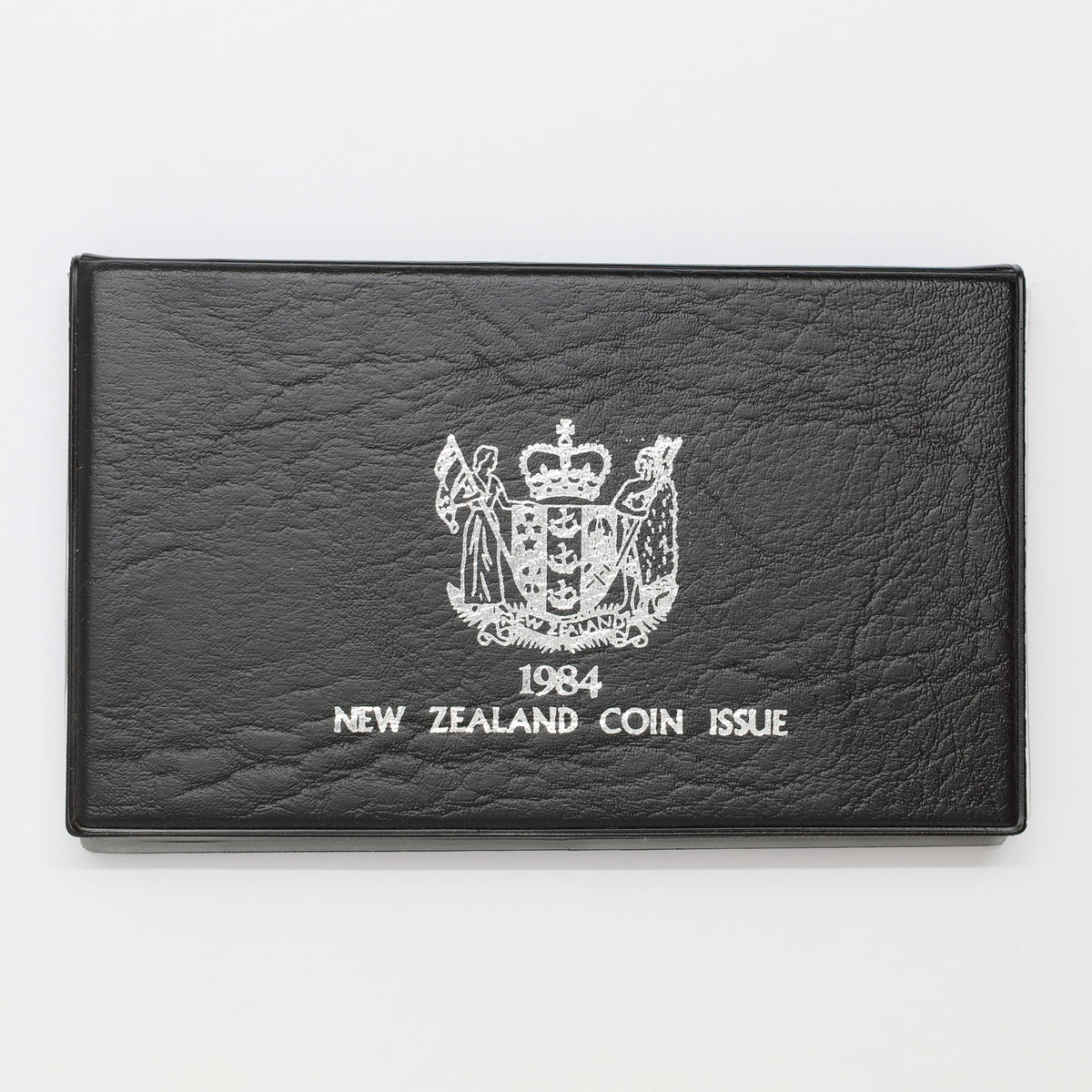 New Zealand 1984 7-Coin Proof Set with Sterling Silver Dollar (light wear)