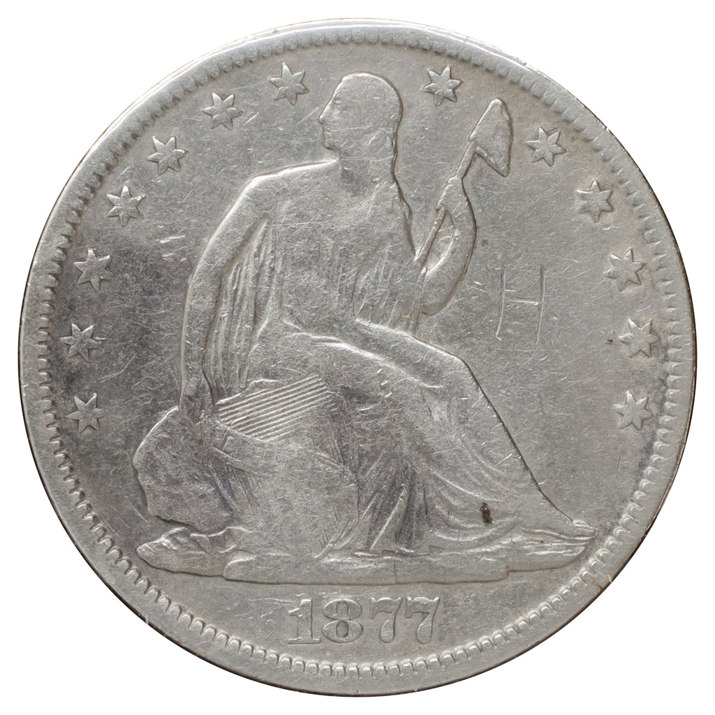 1877 USA Half Dollar F-VF (F15) Scratched, marks, or impaired