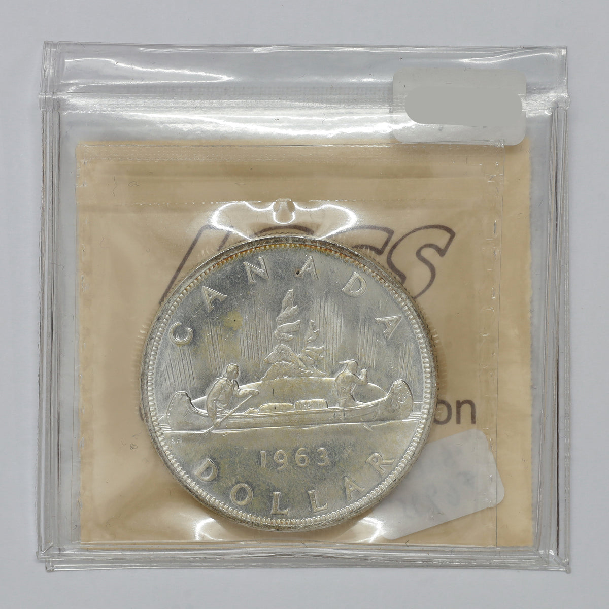 1963 Canada Dollar ICCS Certified MS63 (lightly toned)